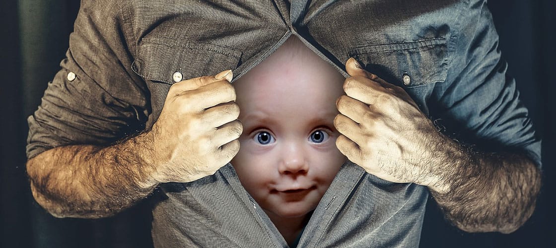 Child coming out of man