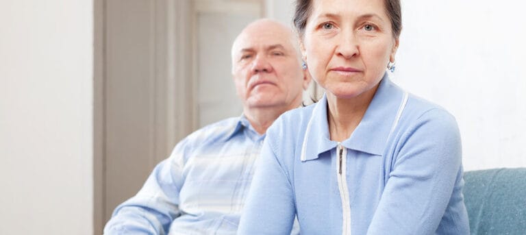unhappy senior couple